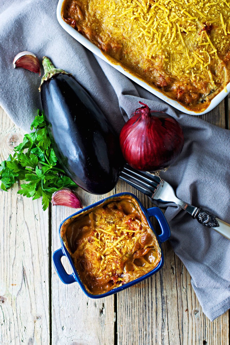 Showing the vegan Moussaka in different casseroles as they come out of the oven.