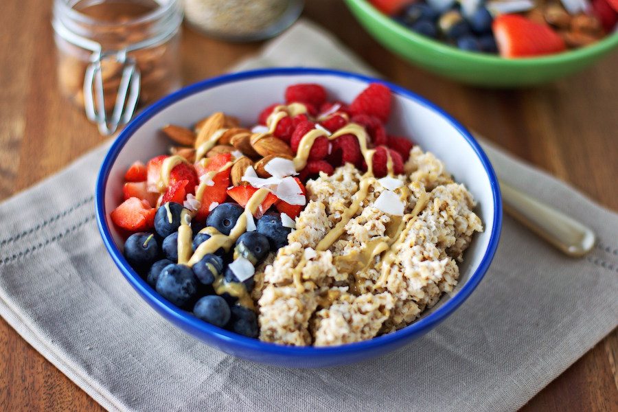 Side view on the Breakfast Bowl placed on a decorative towel. 