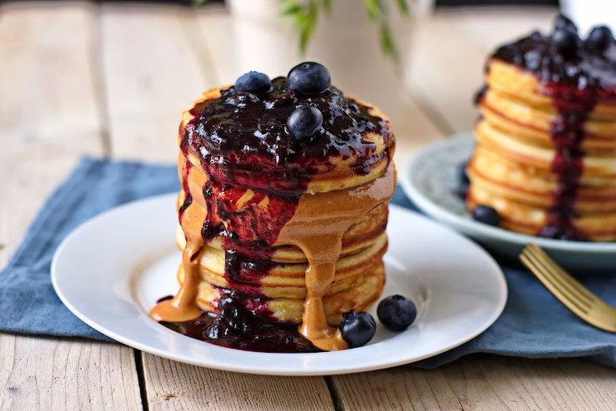 Two plates with stack of vegan Pancakes