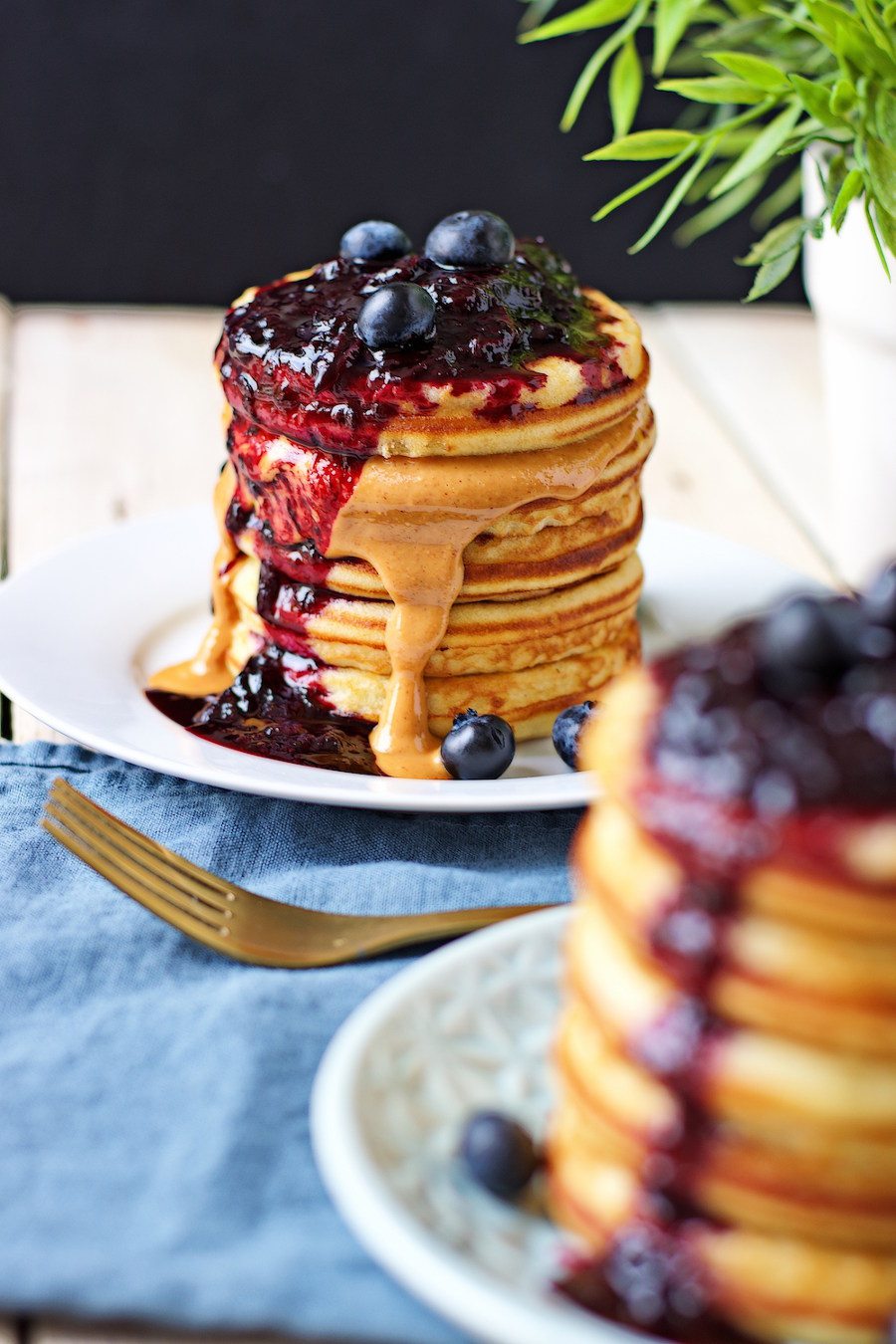 Additional topping with peanut butter on Vegan Pancake stacks.