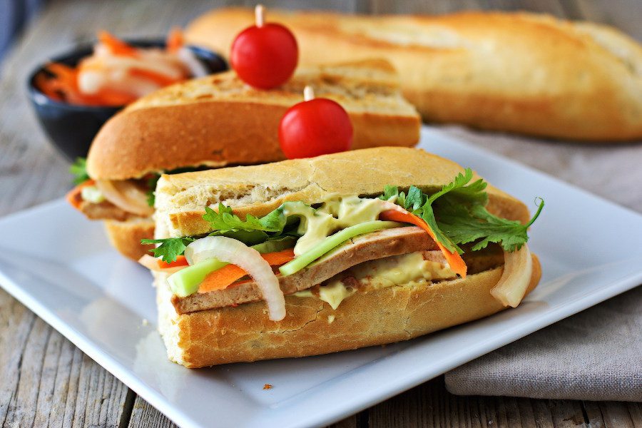 Side view on a Vegan Banh Mi, showing the toppings.