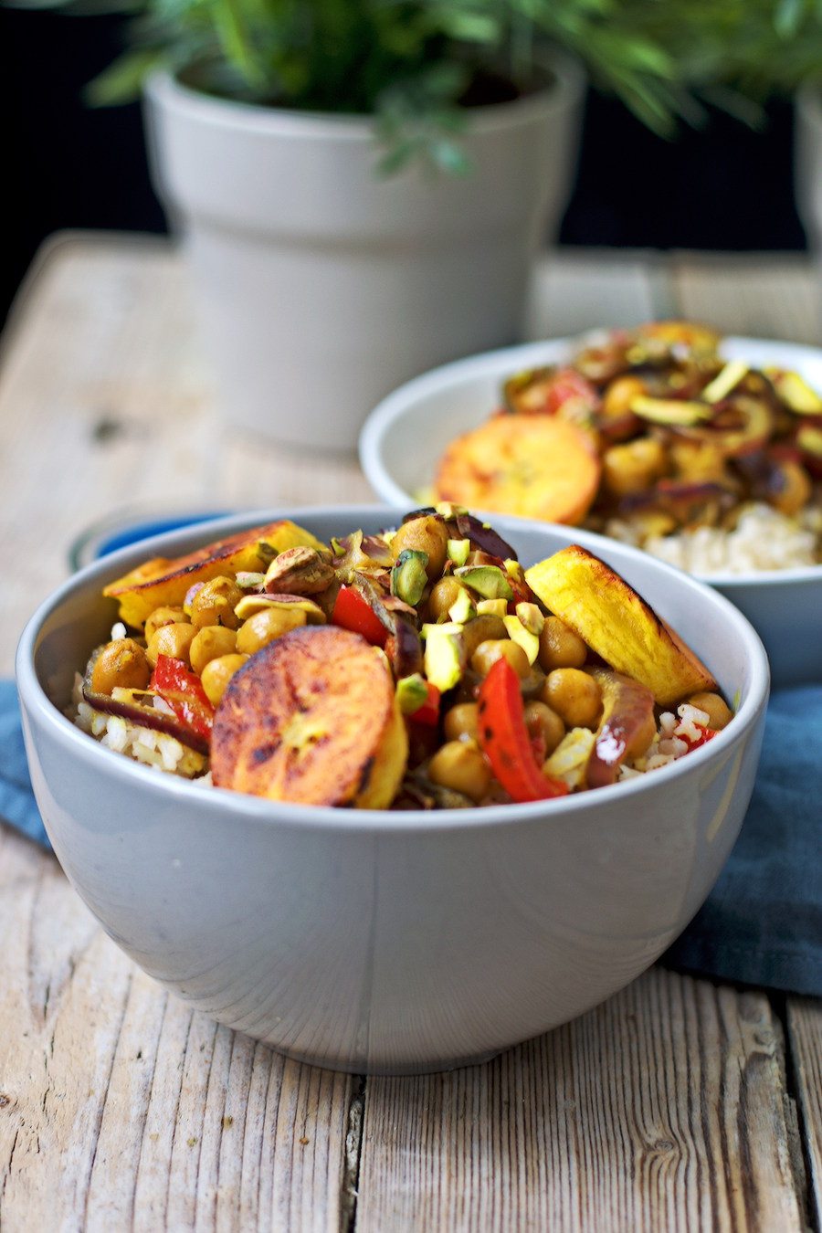 Side view on two bowls filled with the Vegetable Curry with Plantains