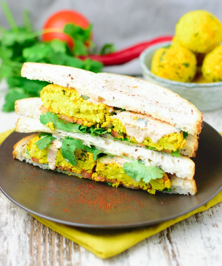 Two sandwiches with the tumeric falafel balls.