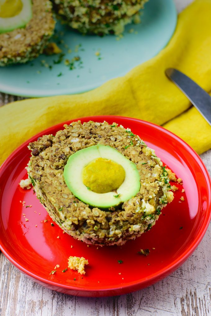 Closeup of the avodavo and mustard filling of the Scotch Egg