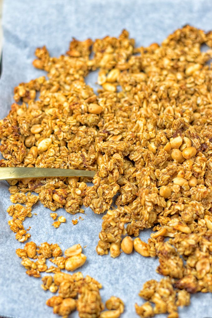 Homemade PB&J Granola on a baking sheet.