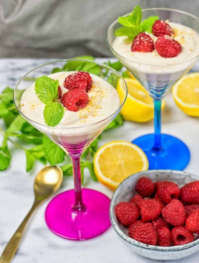 Two cocktail glasses with Lemon Cheesecake Mousse.