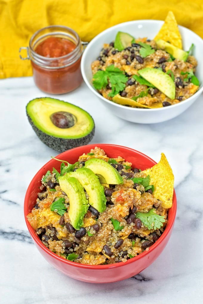 Top view on two bowls of Quinoa Taco Salad.