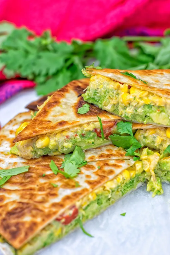 Vegan Cheese Quesadillas garnished with cilantro