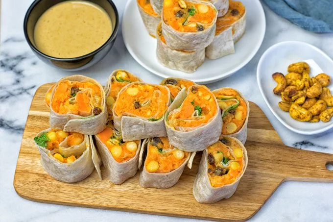 Thai Green Curry Samosa Pinwheels on a serving plate.