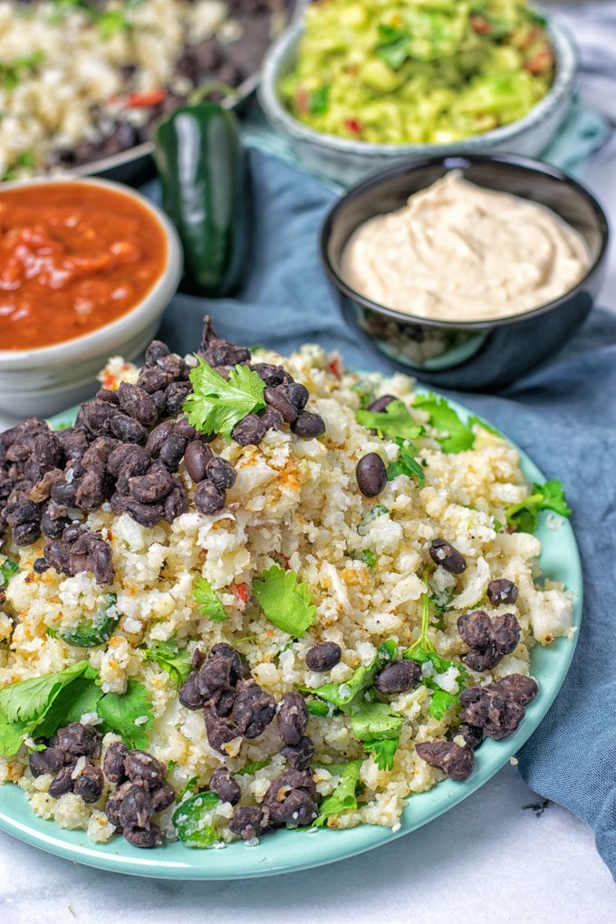 Closeup on a plate, showing the extra black bean topping.