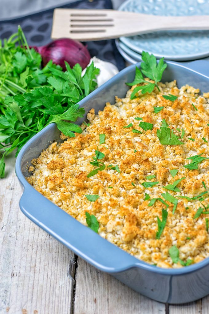 Casserole garnished with fresh herbs.