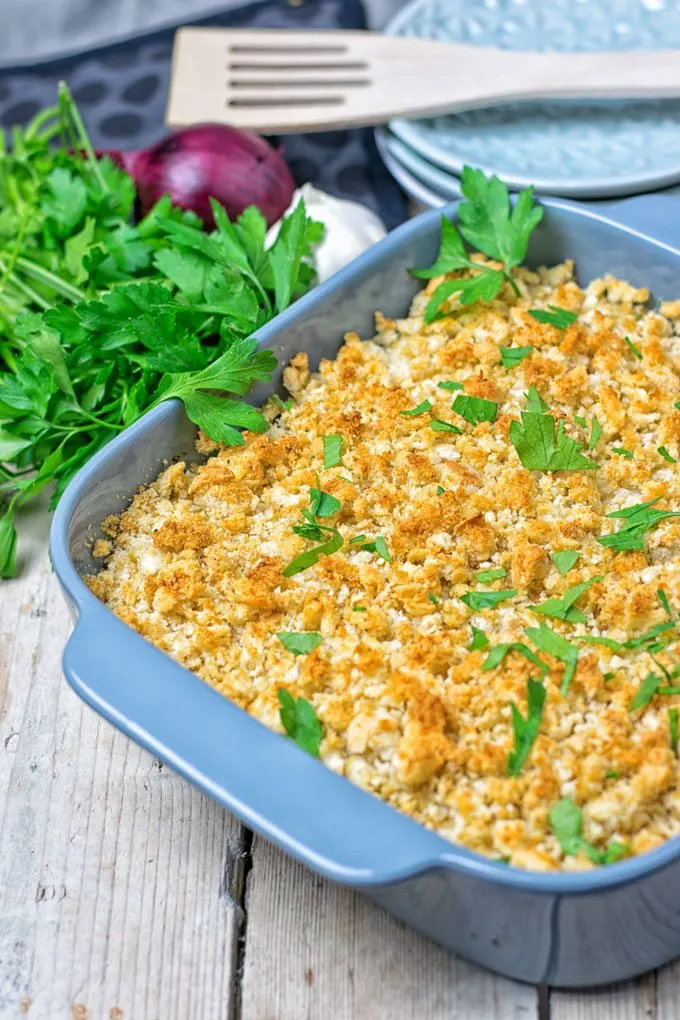 Casserole garnished with fresh herbs.