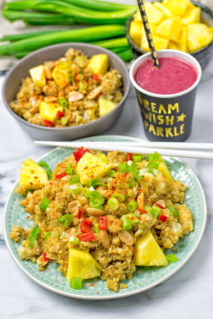 A plate and a bowl of the Thai Green Curry Detox Cauliflower Rice.