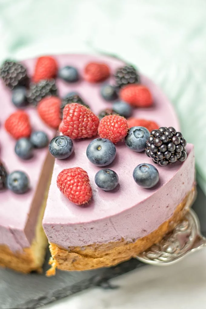 Closeup on slice of Berry Smoothie Yoghurt Cake.