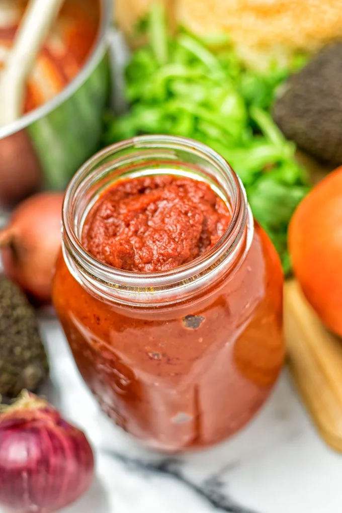 Closeup on the Buffalo Homemade BBQ Sauce in a glass jar.