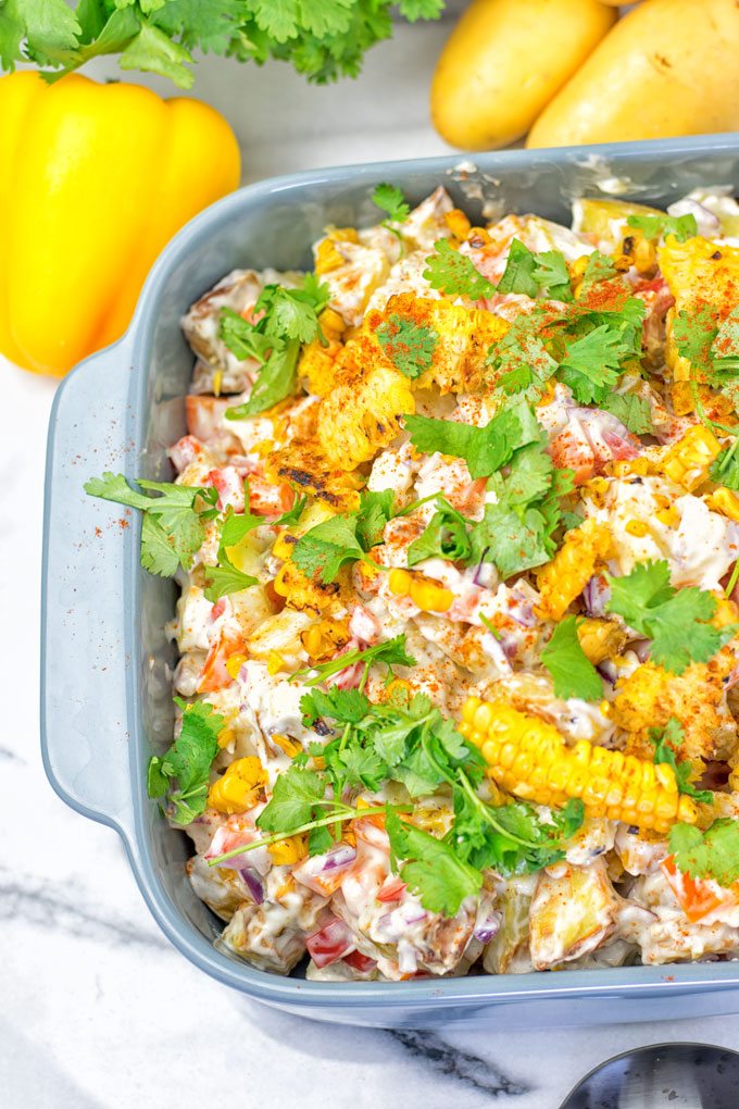 Fresh cilantro is used to garnish the Mexican Street Corn Potato Salad