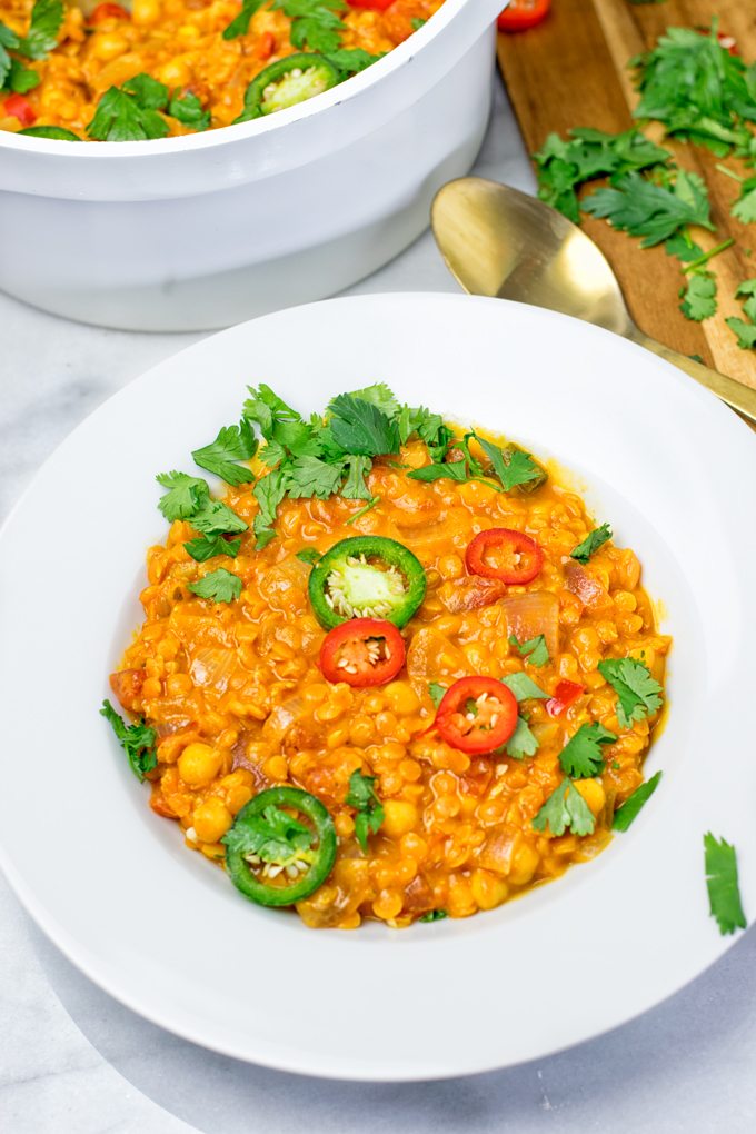 Moroccan Chickpea Lentil Soup on a plate with the pot in background.