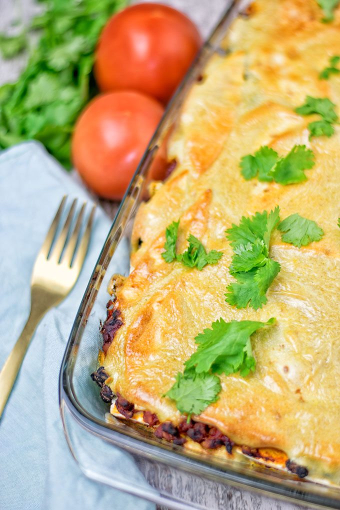 Cheese crust of the Easy Vegan Taco Lasagna in a glass casserole dish.