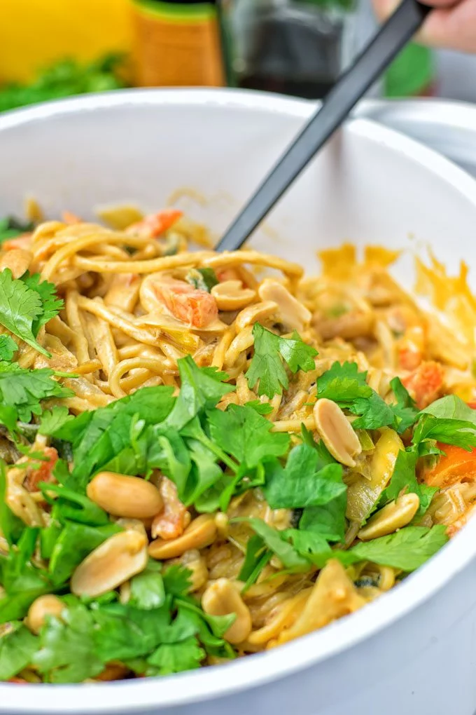 Closeup on cilantro and peanuts.