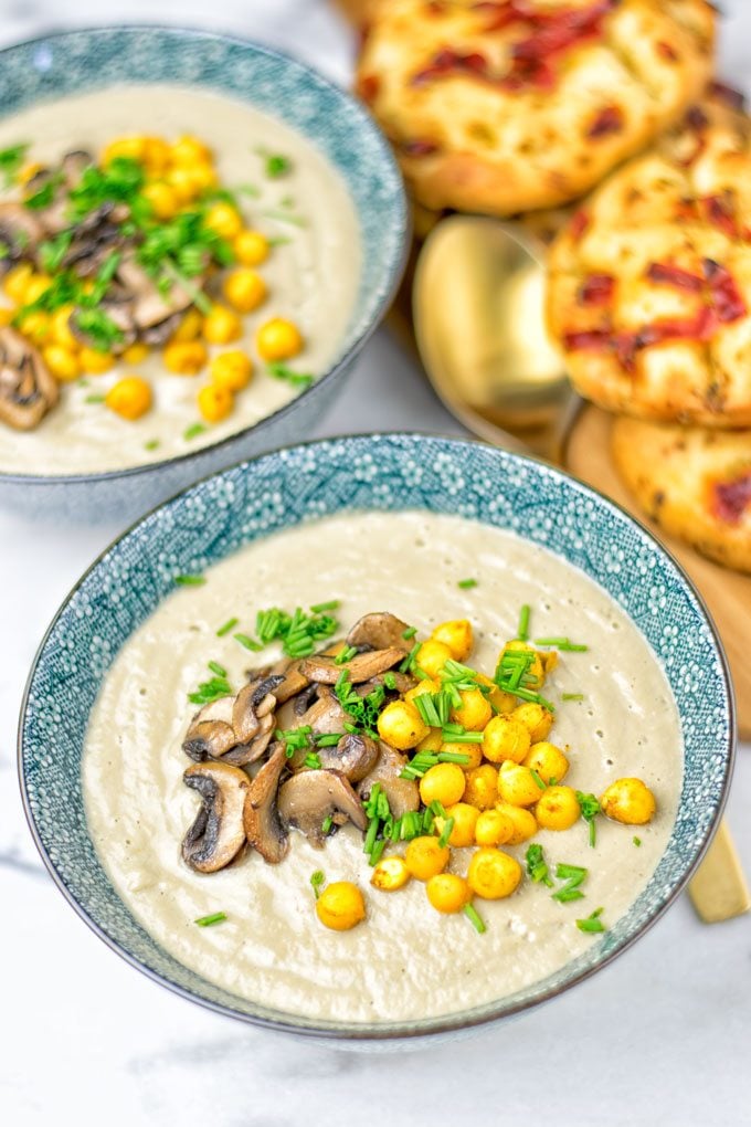 Two bowls of the Roasted Chickpeas Cream of Mushroom Soup 