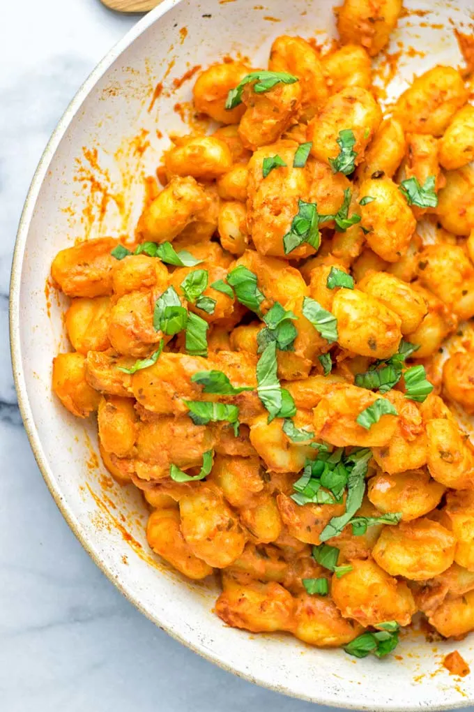 Gnocchi with Garlic Cream Tomato Sauce | #vegan #glutenfree #contentednesscooking #creamy #tahini