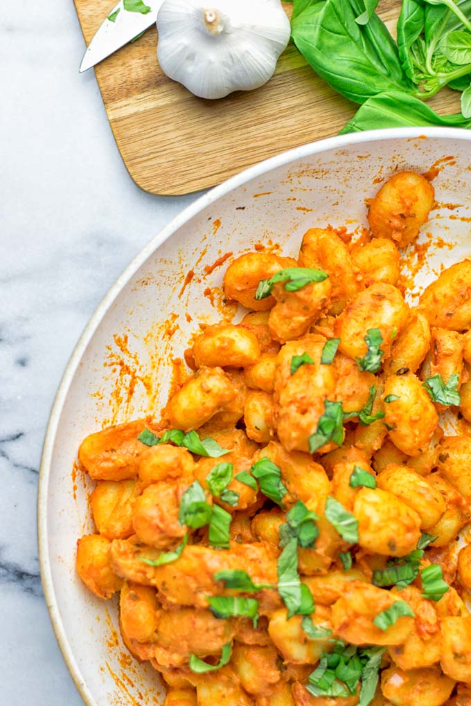 Gnocchi with Garlic Cream Tomato Sauce | #vegan #glutenfree #contentednesscooking #creamy #tahini