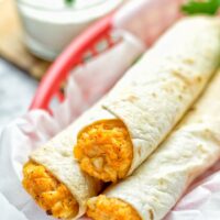These Buffalo Cauliflower Taquitos are the ultimate comfort food. Vegan, gluten free, super easy to make and insanely delicious. An amazing dairy free alternative for dinner, lunch, potluck, party, meal prep, work lunch option. Once you’ll try these, they will go into your daily rotation. #vegan #glutenfree #vegetarian #dairyfree #plantbased #contentednesscooking #lunch #dinner #mealprep #worklunchideas #taquitos #buffalocauliflower #easyfood #budgetfriendly #makeahedmeals #cauliflower