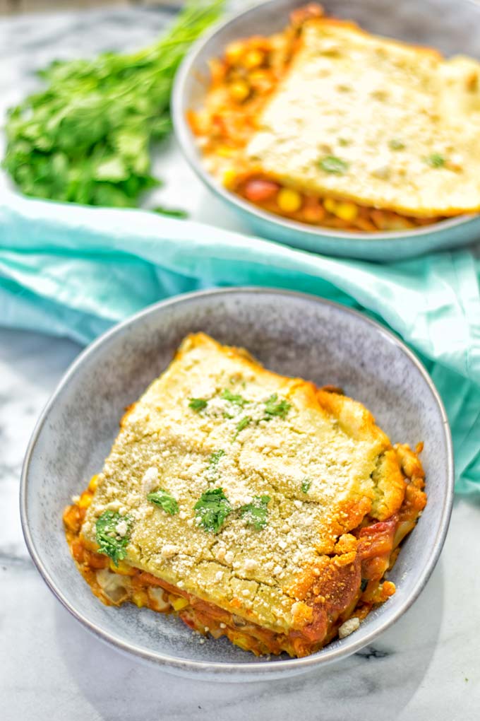 Super easy and delicious: This Enchilada Lasagna is naturally vegan, gluten free and a winning combination for any food lover. An amazing dairy free lunch, dinner, meal prep, work lunch and easy family dinner that will blow you away with just the right amount of flavor and spices. Come and try this fantastic dairy free alternative now, so good! #vegan #glutenfree #vegetarian #dairyfree #enchilada #lasagna #mealprep #worklunchideas #contentednesscooking #dinner #lunch #easyfamilyrecipes #easyfood