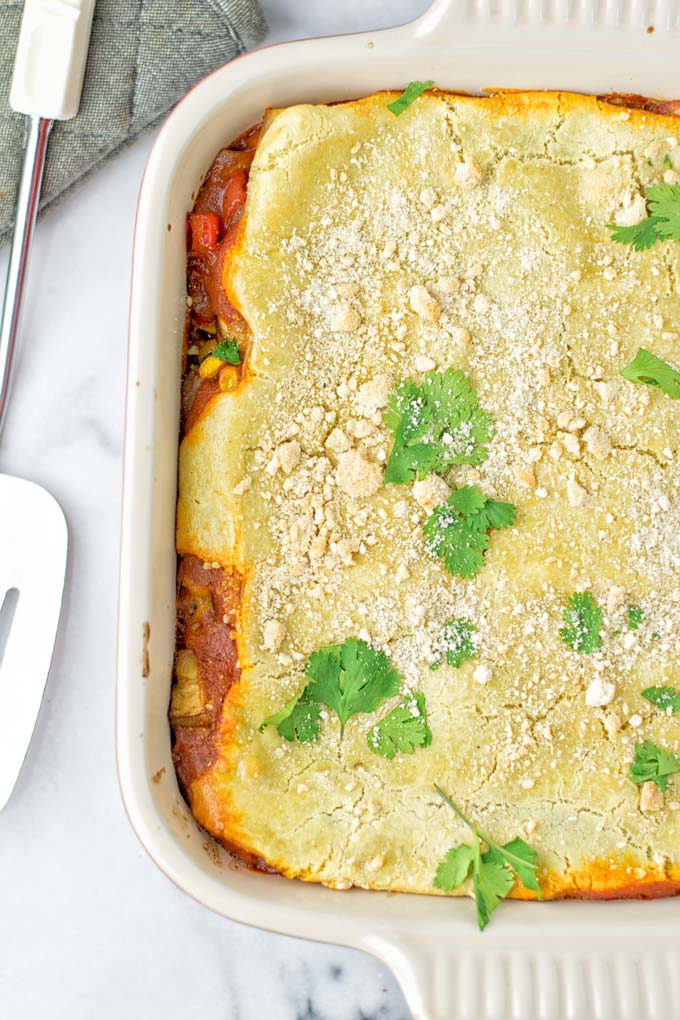 Super easy and delicious: This Enchilada Lasagna is naturally vegan, gluten free and a winning combination for any food lover. An amazing dairy free lunch, dinner, meal prep, work lunch and easy family dinner that will blow you away with just the right amount of flavor and spices. Come and try this fantastic dairy free alternative now, so good! #vegan #glutenfree #vegetarian #dairyfree #enchilada #lasagna #mealprep #worklunchideas #contentednesscooking #dinner #lunch #easyfamilyrecipes #easyfood