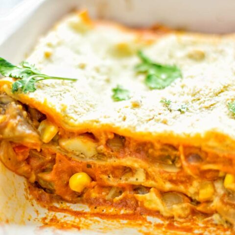 Super easy and fingerlicking delicious: This Enchilada Lasagna is naturally vegan gluten free and a winning combination for any good food lover. An amazing dairy free lunch, dinner, meal prep, work lunch and easy family dinner that will blow you away with just the right amount of flavors and spices. Come and try this fantastic dairy free alternative now, so good! #vegan #glutenfree #vegetarian #dairyfree #enchilada #lasagna #mealprep #worklunchideas #contentednesscooking #dinner #lunch #easyfamilyrecipes #easyfood