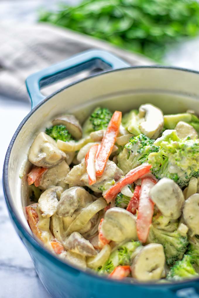 This amazingly satisfying and super easy to make Garlic Broccoli Stir Fry is entirely vegan, gluten free, and so delicious. You can make it in one pan or just make it in the oven. 2 versions, both so insanely delicious for dinner, lunch, meal prep, work lunch or stress free and fast family dinners. #vegan #glutenfree #vegetarian #dairyfree #garlic #broccoli #onepotmeals #onepandinner #familymealplanning #mealprep #worklunchideas #dinner #lunch #ovenmeals #contentednesscooking