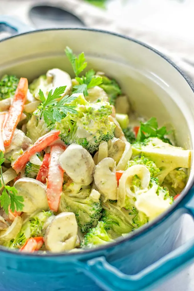 This amazingly satisfying and super easy to make Garlic Broccoli Stir Fry is entirely vegan, gluten free, and so delicious. You can make it in one pan or just make it in the oven. 2 versions, both so insanely delicious for dinner, lunch, meal prep, work lunch or stress free and fast family dinners. #vegan #glutenfree #vegetarian #dairyfree #garlic #broccoli #onepotmeals #onepandinner #familymealplanning #mealprep #worklunchideas #dinner #lunch #ovenmeals #contentednesscooking