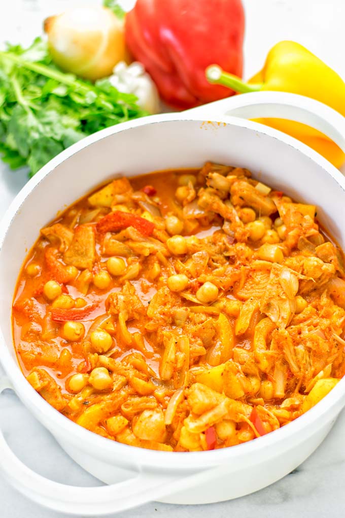 One pot and super easy to make: This Spicy Mango Jackfruit Curry is a winning combo for. Vegan, gluten free. An amazing dinner, lunch, meal prep, work lunch and more. Only one pot is required and in 15 minutes this great dairy free alternative is on the the table. Try it now and wow everyone! #vegan #glutenfree #vegetarian #dairyfree #jackfruit #curry #mango #onepot #mealprep #worklunchideas #lunch #dinner #easyfood #budgetmeals #contentednesscooking #15minuteveganmeals #familyveganmeals