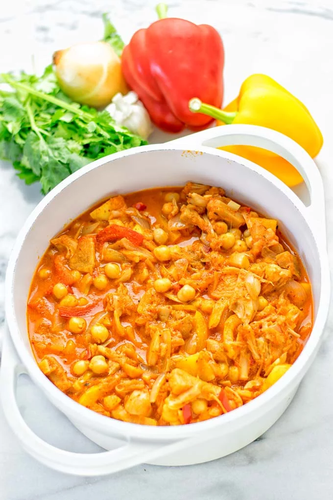 One pot and super easy to make: This Spicy Mango Jackfruit Curry is a winning combo for. Vegan, gluten free. An amazing dinner, lunch, meal prep, work lunch and more. Only one pot is required and in 15 minutes this great dairy free alternative is on the the table. Try it now and wow everyone! #vegan #glutenfree #vegetarian #dairyfree #jackfruit #curry #mango #onepot #mealprep #worklunchideas #lunch #dinner #easyfood #budgetmeals #contentednesscooking #15minuteveganmeals #familyveganmeals