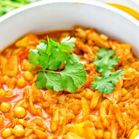 One pot and super easy to make: This Spicy Mango Jackfruit Curry is a winning combo for. Vegan, gluten free. An amazing dinner, lunch, meal prep, work lunch and more. Only one pot is required and in 15 minutes this great dairy free alternative is on the the table. Try it now and wow everyone! #vegan #glutenfree #vegetarian #dairyfree #jackfruit #curry #mango #onepot #mealprep #worklunhideas #lunch #dinner #easyfood #budgetmeals #contentednesscooking #15minuteveganmeals #familyveganmeals