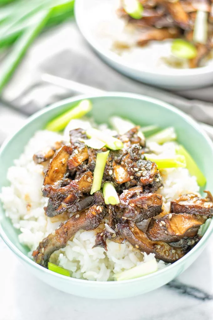 This Vegan Bulgogi is made with portobello mushrooms and inspired by Korean cuisine. It’s hearty, naturally vegan, gluten free and so delicious for dinner, lunch, meal prep and so much more. #vegan #glutenfree #dairyfree #vegetarian #contentednesscooking #easyfood #mealprep #portobellomushrooms #koreanfood #bulgogimarinade #bulgogirecipe #lunch #dinner 