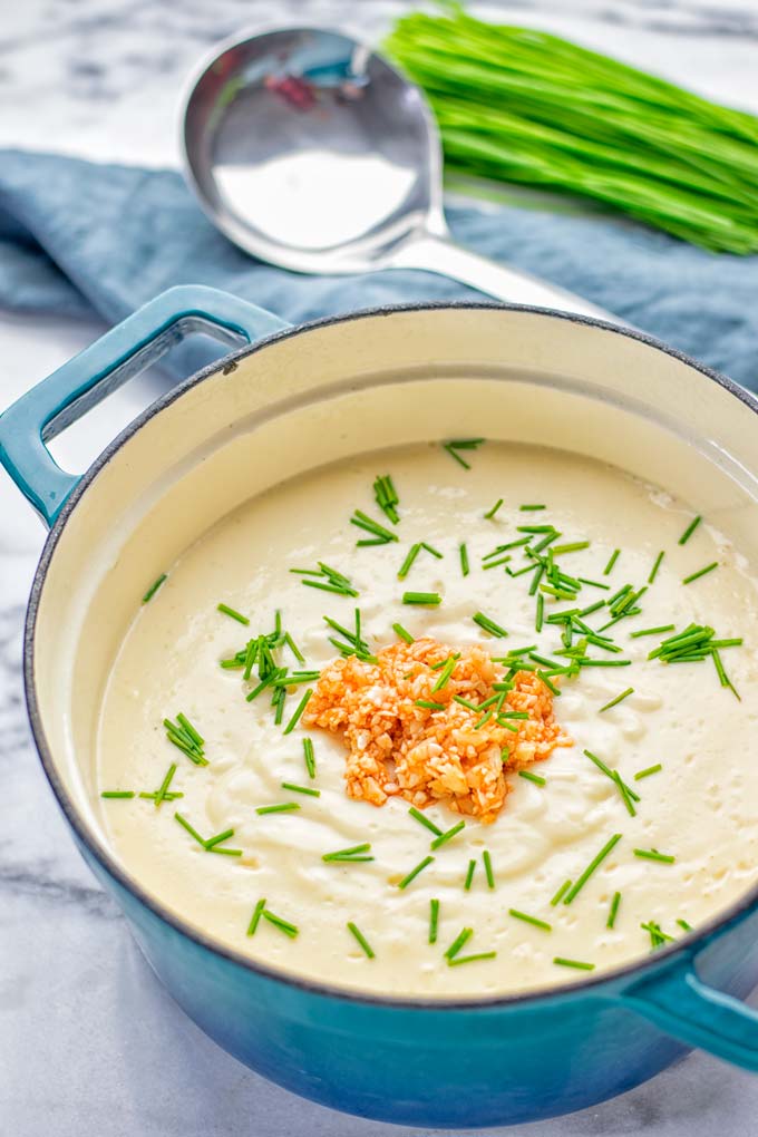 This Buffalo Cauliflower Soup is the ultimate comfort food for everyone and so satisfying. Vegan, gluten free, made without any cream or butter, an amazing and delicious option for dinner, lunch, meal prep, worklunch and so much more. This is a keeper try it now! #vegan #glutenfree #dairyfree #vegetarian #cauliflower #dinner #lunch #soup #mealprep #worklunchideas #easyfood #buffalocauliflower #contentednesscooking