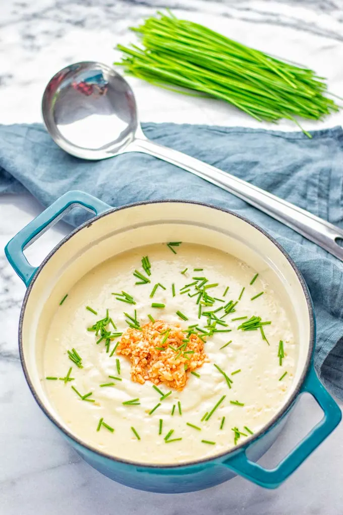 This Buffalo Cauliflower Soup is the ultimate comfort food for everyone and so satisfying. Vegan, gluten free, made without any cream or butter, an amazing and delicious option for dinner, lunch, meal prep, worklunch and so much more. This is a keeper try it now! #vegan #glutenfree #dairyfree #vegetarian #cauliflower #dinner #lunch #soup #mealprep #worklunchideas #easyfood #buffalocauliflower #contentednesscooking