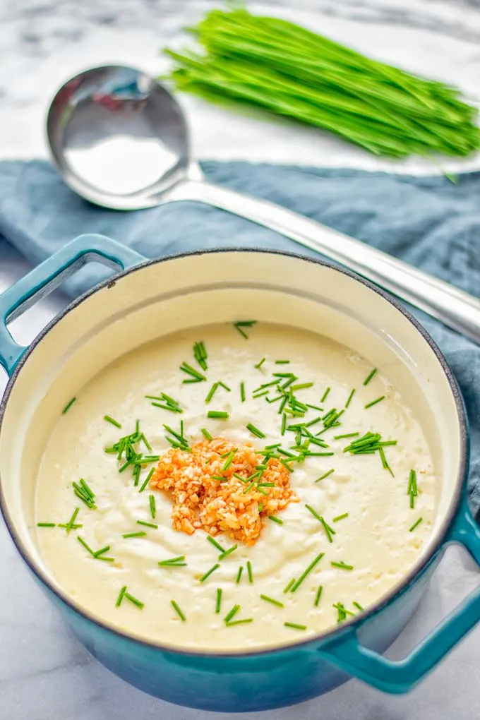 This Buffalo Cauliflower Soup is the ultimate comfort food for everyone and so satisfying. Vegan, gluten free, made without any cream or butter, an amazing and delicious option for dinner, lunch, meal prep, worklunch and so much more. This is a keeper try it now! #vegan #glutenfree #dairyfree #vegetarian #cauliflower #dinner #lunch #soup #mealprep #worklunchideas #easyfood #buffalocauliflower #contentednesscooking