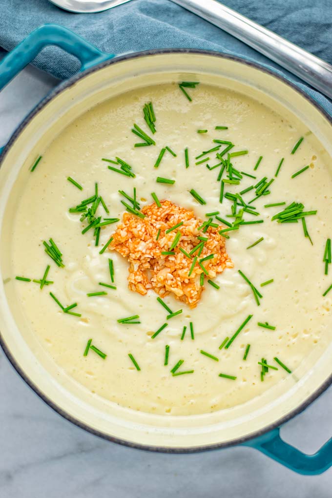 This Buffalo Cauliflower Soup is the ultimate comfort food for everyone and so satisfying. Vegan, gluten free, made without any cream or butter, an amazing and delicious option for dinner, lunch, meal prep, worklunch and so much more. This is a keeper try it now! #vegan #glutenfree #dairyfree #vegetarian #cauliflower #dinner #lunch #soup #mealprep #worklunchideas #easyfood #buffalocauliflower #contentednesscooking