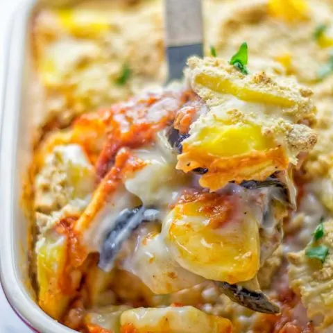 This Eggplant Parmesan Potato Casserole is entirely vegan, gluten free and the ultimate comfort food for everyone. It combines all the flavors of a classic eggplant parmesan with the twist of a comforting potato casserole. Perfect for dinner, lunch, meal prep and work lunch. #vegan #glutenfree #dairyfree #vegetarian #potatocasserole #eggplantparmesan #eggplantparmesanbaked #lunch #dinner #mealprep #worklunchideas #contentednesscooking