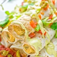 These Green Chili Enchiladas are entirely vegan, gluten free, super easy to make and so delicious. An amazing dairy free alternative for dinner, lunch, meal preparation, work lunch, potlucks, parties and so much more that the whole family will love. #vegan #glutenfree #dairyfree #contentednesscooking #dinner #lunch #mealprep #worklunchideas #easyfood #enchiladas #vegetarian #potluckrecipes #partyfood #mexican #greenchilirecipes