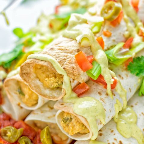 These Green Chili Enchiladas are entirely vegan, gluten free, super easy to make and so delicious. An amazing dairy free alternative for dinner, lunch, meal preparation, work lunch, potlucks, parties and so much more that the whole family will love. #vegan #glutenfree #dairyfree #contentednesscooking #dinner #lunch #mealprep #worklunchideas #easyfood #enchiladas #vegetarian #potluckrecipes #partyfood #mexican #greenchilirecipes