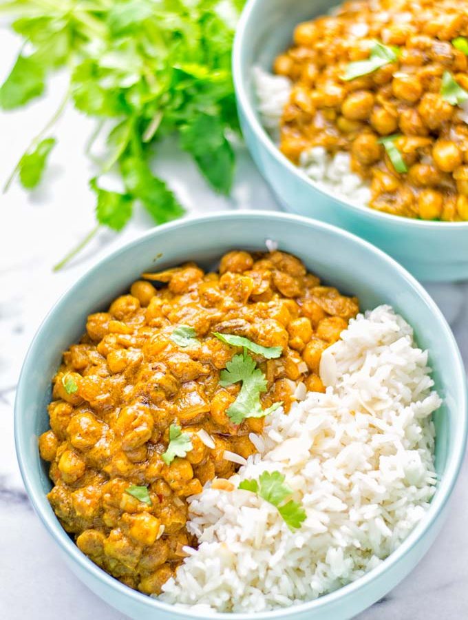 Insanely delicious One Pot Chickpea Biryani full of amazing flavors and naturally vegan, gluten free. An easy dish which is perfect for lunch, dinner, meal prep and work lunch. If you’re looking for a super easy biryani try it now. #vegan #glutenfree #dairyfree #vegetarian #chickpeas #chickpeabiryani #biryani #onepotmeals #mealprep #worklunchideas #dinner #lunch #contentednesscooking