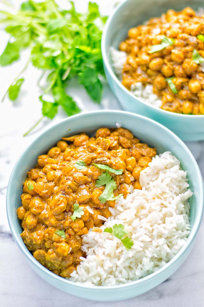 Insanely delicious One Pot Chickpea Biryani full of amazing flavors and naturally vegan, gluten free. An easy dish which is perfect for lunch, dinner, meal prep and work lunch. If you’re looking for a super easy biryani try it now. #vegan #glutenfree #dairyfree #vegetarian #chickpeas #chickpeabiryani #biryani #onepotmeals #mealprep #worklunchideas #dinner #lunch #contentednesscooking