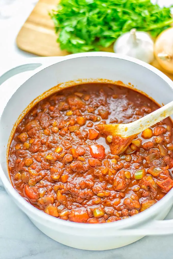 This Chickpea Lentil Bolognese is naturally vegan, gluten free and so super easy to make in one pot. It’s amazing over your favorite pasta for dinner, lunch, meal preparation or a great dairy free alternative for work lunch. #vegan #glutenfree #dairyfree #vegetarian #onepotmeals #dinner #lunch #mealprep #worklunchideas #chickpeas #lentils #chickpeabolognese #lentilbolognese #contentednesscooking