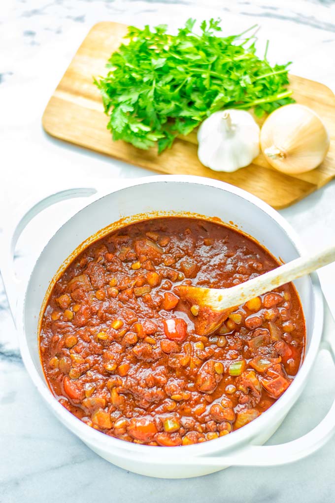 This Chickpea Lentil Bolognese is naturally vegan, gluten free and so super easy to make in one pot. It’s amazing over your favorite pasta for dinner, lunch, meal preparation or a great dairy free alternative for work lunch. #vegan #glutenfree #dairyfree #vegetarian #onepotmeals #dinner #lunch #mealprep #worklunchideas #chickpeas #lentils #chickpeabolognese #lentilbolognese #contentednesscooking