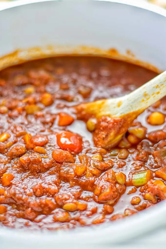 This Chickpea Lentil Bolognese is naturally vegan, gluten free and so super easy to make in one pot. It’s amazing over your favorite pasta for dinner, lunch, meal preparation or a great dairy free alternative for work lunch. #vegan #glutenfree #dairyfree #vegetarian #onepotmeals #dinner #lunch #mealprep #worklunchideas #chickpeas #lentils #chickpeabolognese #lentilbolognese #contentednesscooking