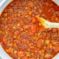 This Chickpea Lentil Bolognese is naturally vegan, gluten free and so super easy to make in one pot. It’s amazing over your favorite pasta for dinner, lunch, meal preparation or a great dairy free alternative for work lunch. #vegan #glutenfree #dairyfree #vegetarian #onepotmeals #dinner #lunch #mealprep #worklunchideas #chickpeas #lentils #chickpeabolognese #lentilbolognese