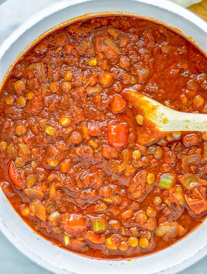 This Chickpea Lentil Bolognese is naturally vegan, gluten free and so super easy to make in one pot. It’s amazing over your favorite pasta for dinner, lunch, meal preparation or a great dairy free alternative for work lunch. #vegan #glutenfree #dairyfree #vegetarian #onepotmeals #dinner #lunch #mealprep #worklunchideas #chickpeas #lentils #chickpeabolognese #lentilbolognese